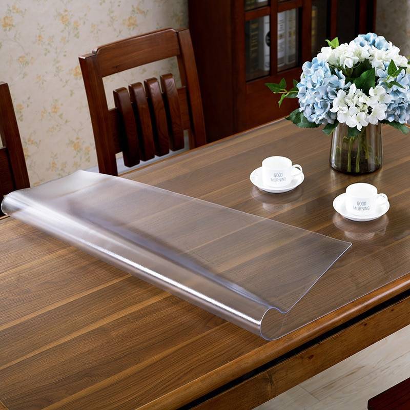 Скатерть из силикона для обеденного стола: прозрачная с бахромой, на овальный и круглый стол, для каких столешниц подойдёт > все про дом